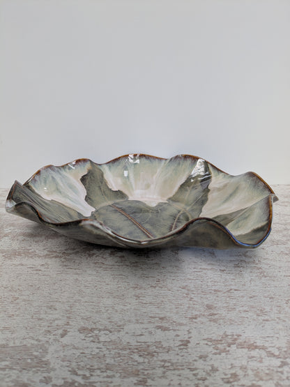 Bladschaal groen/beige met lichte accenten rondom